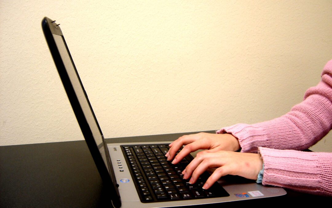 person on computer